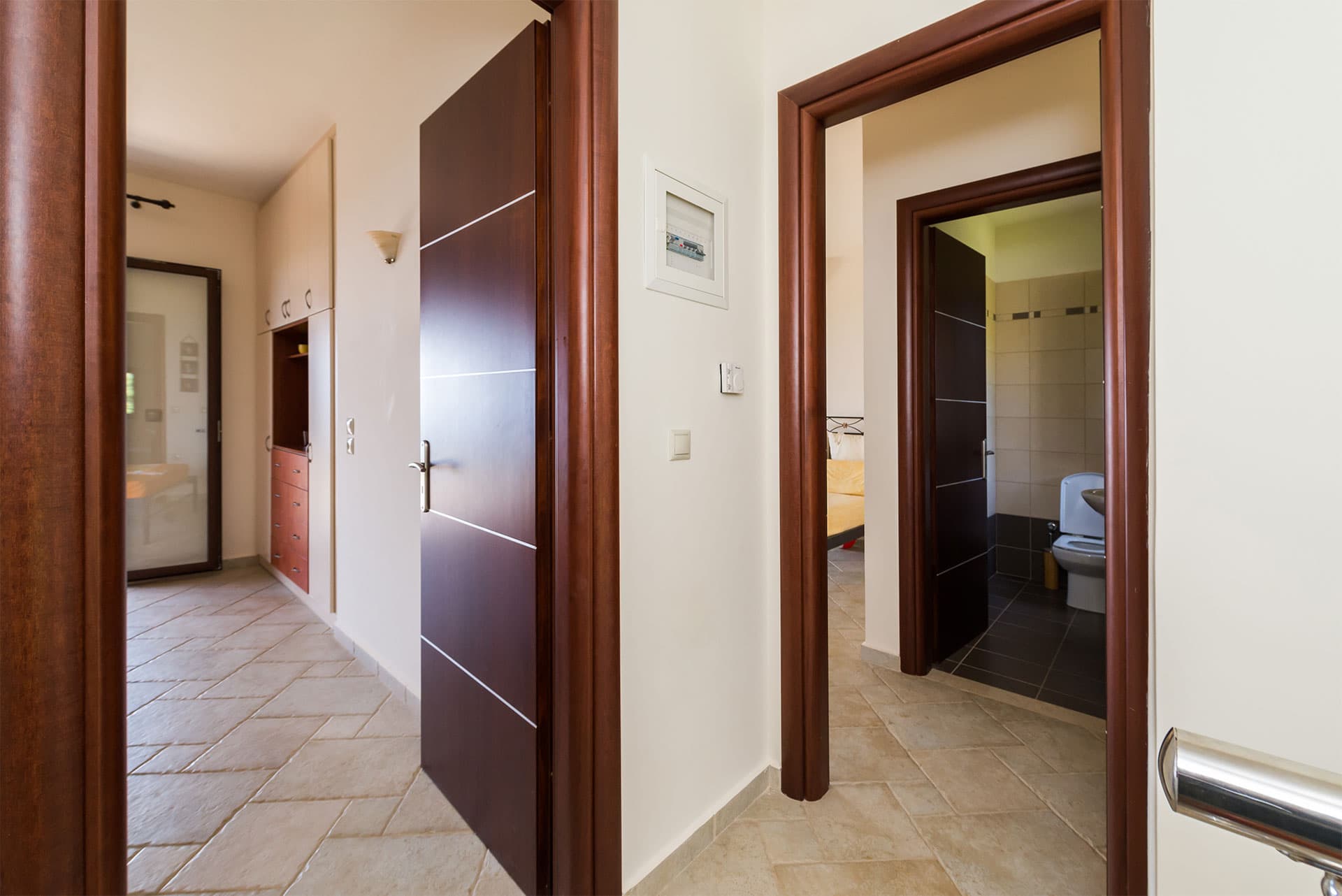 the two master bedrooms on the third level of the house 
